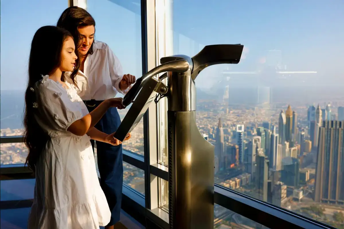 Visitor using the viewing telescope at Burj Khalifa