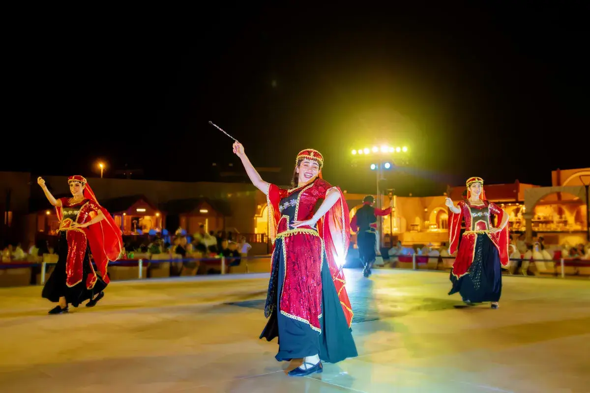 Live cultural dance at a Dubai desert safari camp