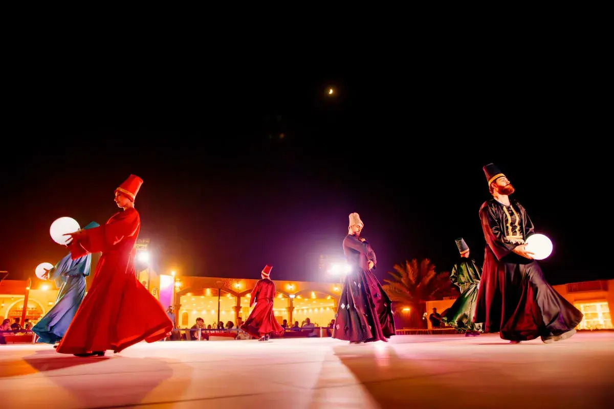 Tanoura performance at a Dubai evening desert safari camp