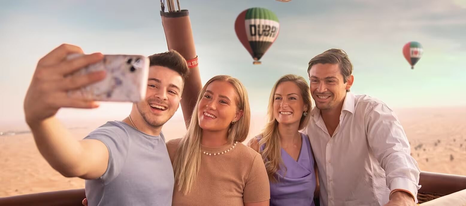 Guests enjoying a hot air balloon flight over the Dubai desert