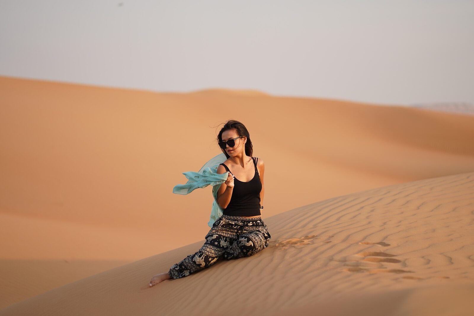 Traveller enjoying the Dubai desert dunes