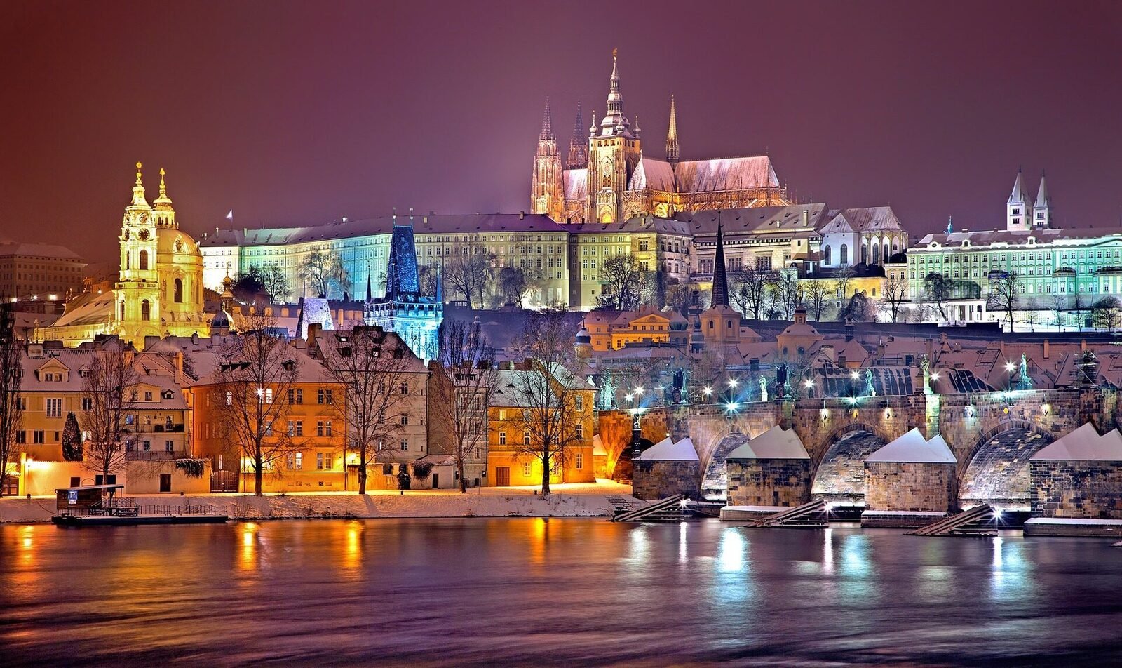Prague skyline at night on a Europe multi country holiday