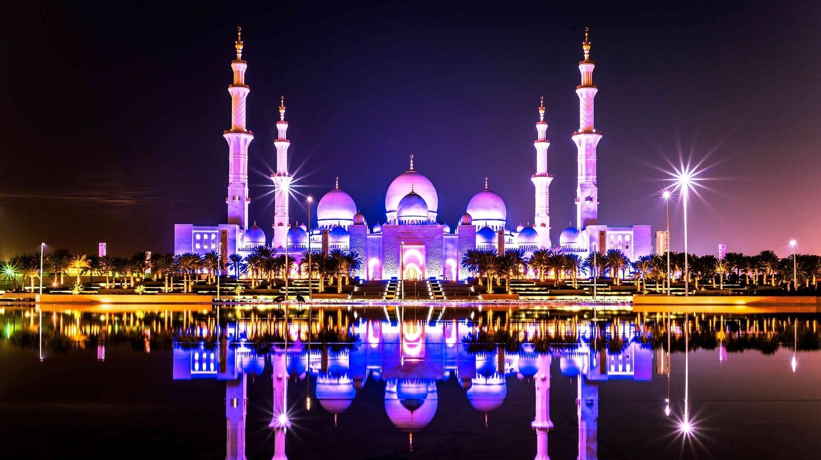 Sheikh Zayed Grand Mosque illuminated at night