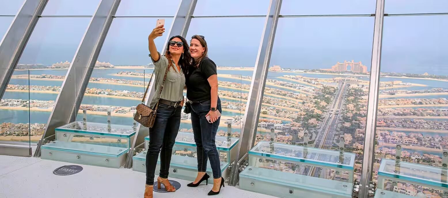 Visitors taking photos at The View at The Palm observation deck